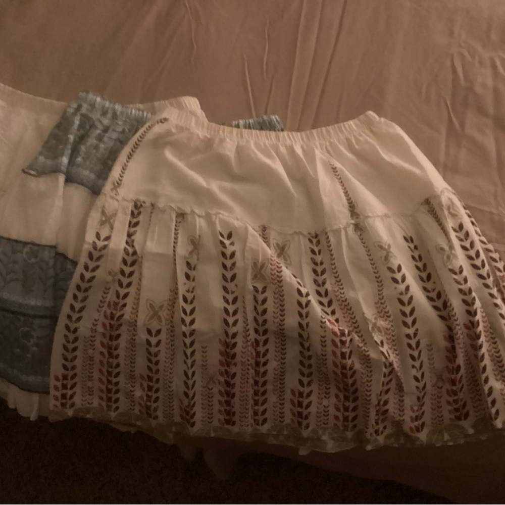 3 skirts for $10
3 Cream Bubble Mini Skirt with Pleated Tiers
